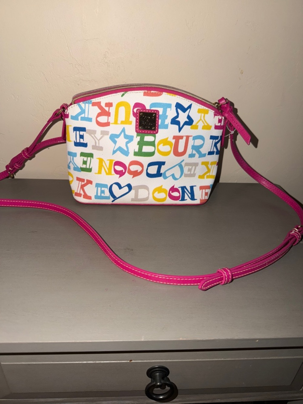 Dooney & Bourke Kids White Multicolor Logo Crossbody with Pink Trim